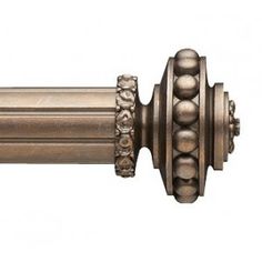 an old fashioned curtain rod with decorative beading on it's end and ends