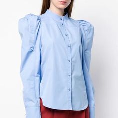 New With Tags. 100%Cotton Made In France. Designer Blue Blouse For Spring, Designer Blue Tops With Button Closure, Blue Puff Sleeve Shirt For Work, Designer Blue Tops With Buttons, Blue Blouse With Blouson Sleeves For Work, Chic Blue Puff Sleeve Shirt, Blue Puff Sleeve Shirt For Spring, Blue Padded Blouse For Work, Elegant Blue Blouse With Puff Sleeves