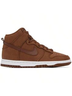 Nike 
Brown Dunk Premium High Sneakers 
High-top nubuck sneakers in brown. Buffed leather trim throughout. 
. Perforated detailing at round toe 
. Lace-up closure 
. Textile logo patch at padded tongue 
. Padded collar 
. Swoosh appliqué at sides 
. Pull-loop at heel 
. Treaded rubber sole 
Please note that this item may be shipped only within North America. 
Supplier color: Pecan/Pecan-white 
Upper: leather. Sole: rubber. 
Made in Indonesia. 
231011F127000 
Brown Dunk Premium High Sneakers defa High Sneakers Women, Casual Athletic Shoes, Nike Brown, Textile Logo, High Sneakers, Casual Sneakers Women, Casual Athletic, Womens Athletic Shoes, Outdoor Shoes