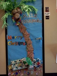 a bulletin board with a christmas tree on it