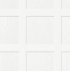 white wood paneled doors with square and rectangles in the center, all painted white