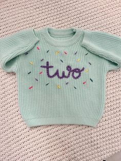 Looking for a unique and thoughtful gift for a beloved kiddo's birthday? Need a special, one of a kind, personalized sweater for a birthday photo shoot? This oversized, hand embroidered sweater is a charming and one-of-a-kind item to commemorate birthday milestones for babies, toddlers and children! You can add your personalization in the box at check out.  Sweater colors: See photo Embroidery colors: See photo Styles: -confetti  -dinosaur -trucks -unicorn -Custom ideas welcomed, just message me Milestones For Babies, Hand Embroidered Sweater, Photo Embroidery, Sweater Colors, Sweater Embroidery, Birthday Sweater, Photo Styles, Personalized Sweater, Birthday Milestone