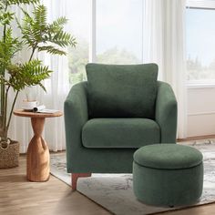 a green chair and ottoman in a living room