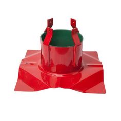 a green and red bucket sitting on top of a red object