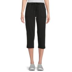 Indulge in comfort and style with the Athletic Works Core Knit Capri pant. Created for all-day ease, its soft jersey fabric ensures a cozy fit. This classic silhouette, featuring pockets and adjustable drawcord waistband, is versatile and effortlessly transitions from casual outings to active pursuits. Size: S.  Color: Black.  Gender: female.  Age Group: adult. Casual Solid Color Capris For Loungewear, Casual Solid Color Loungewear Capris, Black Cotton Capris With Elastic Waistband, Casual Stretch Black Capris, Black Stretch Casual Capris, Casual Black Knee-length Capris, Black Relaxed Fit Capris With Pockets, Black Relaxed Fit Capris, Black Capris For Sports In Spring