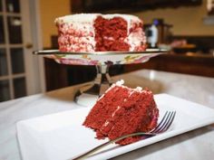 a slice of red velvet cake on a plate