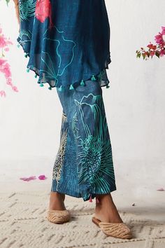 Blue kaftan with floral prints and embellished neckline. Paired with printed pant. - Aza Fashions Summer Festive Floral Print Pants, Festive Summer Silk Bottoms, Floral Print Bottoms For Spring Festivities, Spring Floral Print Festive Bottoms, Spring Festive Floral Print Bottoms, Floral Print Bottoms For Festive Spring Occasion, Bohemian Summer Pants With Printed Motifs, Summer Bohemian Pants With Printed Motifs, Blue Georgette Sets For Summer