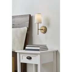 The modern design of the Better Homes & Gardens Meadowood Wall Sconce stands out in any home. The vintage lantern shape adds style to any space while the white fabric shade softly distributes light. A burnished brass finish completes the modern glam motif. Perfect for placing on either side of your bed, above your sink in the kitchen, or above your couch in the living room as a stunning statement piece. Size: One Size.  Color: Gold. Bed Side Wall Lamp, Vintage Sconces Bedroom, Mantle With Sconces, Bed Side Wall Lights, Bedside Sconces Wall Mount, Sconces In Bedroom, Bedside Sconces, Night Stand Light, Vintage Sconces