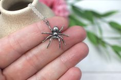 Spider Necklace.  This Spider Necklace features a beautifully creepy and highly detailed sterling silver Tarantula pendant on a solid .925 sterling silver chain finished with a lobster clasp closure.  Spider measures 26mmx21mm (1 inch = 25mm) and is 3D.  Chain length in your choice of 16" up to 22" with option to add a removable 2" sterling silver chain extender. If your purchase is a gift, make it extra special with a complimentary, custom printed gift note, available upon request (see last pic Silver Jewelry With Oxidized Finish For Halloween, Sterling Silver Charms Necklace For Halloween, Silver Charms Necklace For Halloween, Silver Halloween Charms Necklace, Gothic Sterling Silver Necklace With Lobster Clasp, Sterling Silver Necklaces For Halloween Gift, Unique Silver Halloween Jewelry, Halloween Engraved Sterling Silver Necklaces, 3d Spider