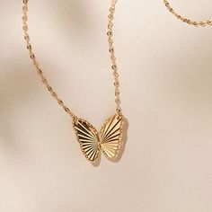 Butterfly Pendant in 14K Yellow Gold (18 in) | Shane Co. 14k Gold Butterfly Pendant Necklace, Elegant 14k Gold Butterfly Pendant Necklace, Elegant 14k Gold Butterfly Jewelry, Elegant Sterling Silver Butterfly Necklace In Yellow Gold, Elegant Yellow Gold Sterling Silver Butterfly Necklace, Elegant Yellow Gold Butterfly Necklace, 14k Yellow Gold Butterfly Pendant Necklace, Luxury Yellow Gold Butterfly Charm Jewelry, 14k Yellow Gold Necklace With Butterfly Charm