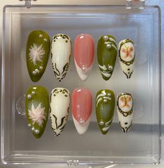 These beautiful custom green/pink flower spring gel press-on nails are handmade line by line and can be customized with any color of your liking. Please make sure to mention what shape and size nail you want. Neutral Green Nails, Green Whimsical Nails, Green Nails Flower, Pink Rose Nail Designs, Green Gel X Nails, Green Flower Design Nails, Green Rose Nails, Green And Pink Nails Designs, Sage Green Fairy Nails