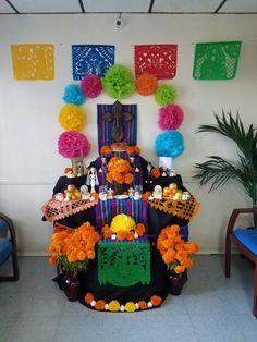 a table topped with lots of cakes and decorations