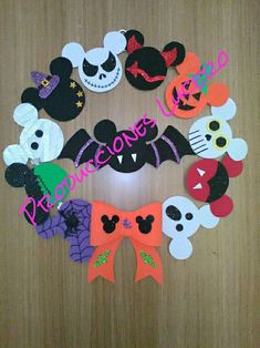 mickey mouse and friends halloween wreath made out of felt