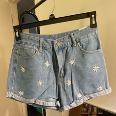 Super Cute Higher Rise Shein Jean Shorts With Cute Daisy Embroidery On The Front. Never Worn Or Washed, Too Big And Didn’t Return Reach Out With Questions Or Offers! Casual High Waist Bottoms With Floral Embroidery, Casual High Waist Floral Embroidered Bottoms, Cute Embroidered Blue Bottoms, Embroidered Summer Bottoms For Day Out, Trendy Embroidered Summer Bottoms, Trendy Summer Bottoms With Floral Embroidery, Embroidered Bottoms For Summer Day Out, Trendy Blue Bottoms With Floral Embroidery, Casual Floral Embroidered Shorts For Spring