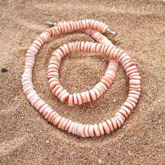 Inspired by the beautiful colors of coral puka shells, this island made necklace features an easy barrel fastener. Coral puka shells Barrel fastener Hand-made, each unique Length: ~ 18" Coral Jewellery, Hawaiian Dresses, Hawaiian Necklace, Island Jewelry, Hawaiian Jewelry, Puka Shell, Hawaiian Dress, Coral Necklace, Coral Jewelry