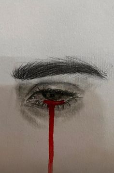 an eye with long lashes and red blood dripping from it