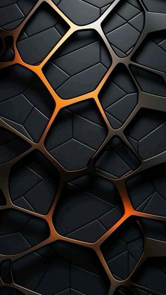 an abstract black and gold wallpaper with hexagonal shapes in the center, as well as orange highlights