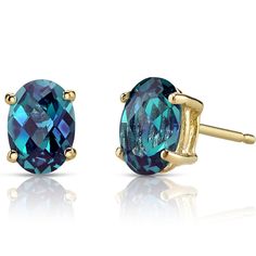 PRICES MAY VARY. PEORA QUALITY CREATED ALEXANDRITE - Known to be one of the most mesmerizing stones, Peora Created Alexandrite Earrings are stunningly unique and a must-have jewelry piece. Featuring 7x5mm, 2 Carats total, Oval Cut Created Alexandrite stones set in classic 4-prong 14K Yellow Gold earrings. Created Alexandrite changes color from teal to purple depending on lighting conditions. 14K Gold Friction Backs to match. EXCEPTIONAL QUALITY - Every Peora Created Alexandrite is hand selected Tanzanite Studs, London Topaz, London Blue Topaz Earrings, Alexandrite Jewelry, Peacock Jewelry, Shine Jewelry, Paris Jewelry, Blue Topaz Earrings, Rings Diamond