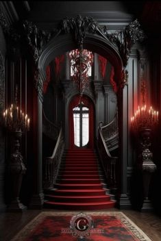 an ornate staircase with red carpet and chandelier