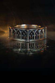 Sterling Silver Gothic Ring, Vintage Ring, Medieval Jewelry, Gift Idea, Goth Accessories, Gothic Jewelry, Handmade Wedding Ring, Unique Ring New ring "Triforium" from the Gothic collection. Crafted from high-quality sterling silver, this ring features intricate Gothic-inspired details that evoke the mystery and grandeur of ancient architecture. Triforium is a triple arch, in medieval Romanesque and Gothic cathedrals of Western Europe - a narrow low gallery of the second tier of the main nave. Th Gothic Engraved Wedding Rings, Medieval Silver Rings For Larp, Medieval Engraved Jewelry For Weddings, Gothic Sterling Silver Wedding Rings, Medieval Engraved Wedding Jewelry, Medieval Style Engraved Wedding Jewelry, Medieval Style Wedding Ring Jewelry, Medieval Style Wedding Jewelry, Gothic Silver Rings With Intricate Design