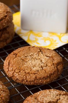 cookies cooling on a wire rack next to a yellow napkin