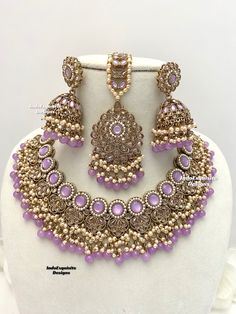 Antique Gold Polki Necklace Set comes with Jhumki earrings and tikka / Indian Jewelry/ High Quality Kundan and Polki Jewelry/ Bollywood Jewelry/Wedding Jewelry/lavender/lilac/light purple    All items are shipped from Brampton, Ontario, Canada. If you need your item by a certain day, please reach out to us for express delivery option before placing the order so that we can update the shipping for you. Standard shipping/delivery timeline Below are the delivery timeline estimates once the order ia Purple Indian Jewelry Set, Festive Bollywood Purple Jewelry, Festive Purple Bollywood Jewelry, Purple Kundan Jewelry For Diwali, Traditional Purple Kundan Necklace For Festive Occasions, Traditional Purple Kundan Necklace For Festivities, Traditional Purple Necklace For Festive Occasions, Festive Traditional Purple Kundan Necklace, Traditional Purple Necklace For Festive Season