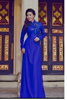 Brand New High Quality Vietnamese Ao Dai. Fast/Free Priority (1-3 day delivery) via USPS. Size Chest/Bust Waist (in/cm) S31in/79cm26in/66cm M32in/81cm27in/69cm L35in/89cm30in/76cm XL36in/91cm31in/79cm 2XL37in/94cm32in/81cm 3XL38in/97cm34in/86cm Ao Dai Length is 55in Pants Length is 44in Please provide Bust, Waist, and Hip measurements when placing your order so we can ensure the best fit for you. Please note: Almost all Ao Dai have some sewing Chalk Marks because these are Brand New, unwashed Ao Elegant Blue Ao Dai For Formal Occasions, Elegant Blue Fitted Ao Dai, Formal Blue Ao Dai For Spring, Fitted Long Sleeve Embellished Ao Dai, Embellished Fitted Long Sleeve Ao Dai, Blue Ao Dai For Spring Formal Occasions, Long Sleeve Embellished Royal Blue Dress, Royal Blue Embellished Long Sleeve Dress, Embellished Royal Blue Long Sleeve Dress