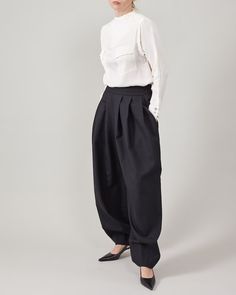 Pleated Balloon Pants for Women Elegant, Stylish Pants, Very Cozy and Stylish, Made of Black Wool Fabric Made in Italy. - Etsy Romania Black Wool Wide Leg Office Pants, Black High-waisted Wool Wide Leg Pants, Black Wool High-waisted Wide Leg Pants, Chic Black Wool Bottoms, Chic Black Wool Wide Leg Pants, Modern Baggy Pants For Workwear, Black Wool Wide Leg Pants For Work, Black Wool Wide Leg Work Pants, Chic Black Wool Dress Pants