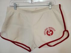 Vintage 1970s Chico State University white/red polyester athletic shorts measures 30" x 3" Go Wildcats! Small light stain on back. Other than that, near mint easy. I can't read the maker tag though.  Please see our other listings for more vintage garments with new items added nearly daily. Pete's Obsolete is smoke-free. We present garments as honestly as possible and point out any known flaws. We leave cleaning and/or repair decisions to you. Please note, if you are interested in our wool collection, we cannot guarantee that we can identify every nearly invisible moth hole that is often present in vintage wool. We wrap and pack all items securely in boxes and use new USPS Priority Mail or Ground Advantage packaging unless the item is very large or an unusual size. Please see photos for con Chico State University, Chico State, Mint Shorts, Vintage Textiles, Small Light, Vintage Sports, Light Stain, Short Shorts, Vintage Wool