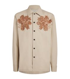 Buy from $1574.00: Where opulence meets heritage, Dries Van Noten boasts a generational knowledge of tailoring that imbues each piece with a refined sense of expertise. Deftly embroidered with a floral design, this shirt is an elite example. It adds a refined edge no matter if its worn with your favourite tailored trousers or open over a T-shirt. Formal Festive Embroidered Shirt, Festive Formal Embroidered Shirt, Elegant Festive Shirt With Floral Embroidery, Designer Long Sleeve Embroidered Shirt, Designer Embroidered Long Sleeve Shirt, Elegant Floral Embroidery Shirt For Festive Season, Elegant Fitted Shirt With Resham Embroidery, Designer Embroidered Shirt For Work, Designer Embroidered Workwear Shirt