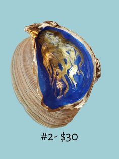 a blue and gold sea shell with the words 2 - $ 350 written below it