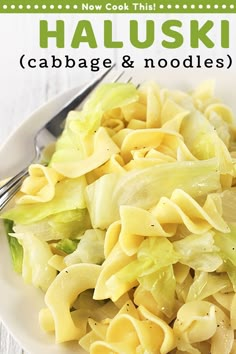 a white plate topped with pasta and cabbage