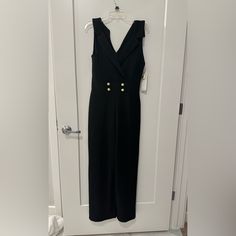 Black Tuxedo Styled Jumpsuit. Size Junior Xl (Fits Women’s Size Small-Medium). Includes Extra Button. Nwt. Elegant Buttoned Jumpsuits And Rompers For Party, Elegant Sleeveless Jumpsuits And Rompers With Buttons, Elegant V-neck Jumpsuits And Rompers With Buttons, Elegant V-neck Jumpsuit Or Romper With Buttons, Elegant V-neck Jumpsuit With Buttons, Elegant V-neck Jumpsuit With Button Closure, Tuxedo Style, Fits Women, Black Tuxedo