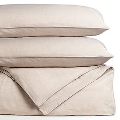 three pillows stacked on top of each other