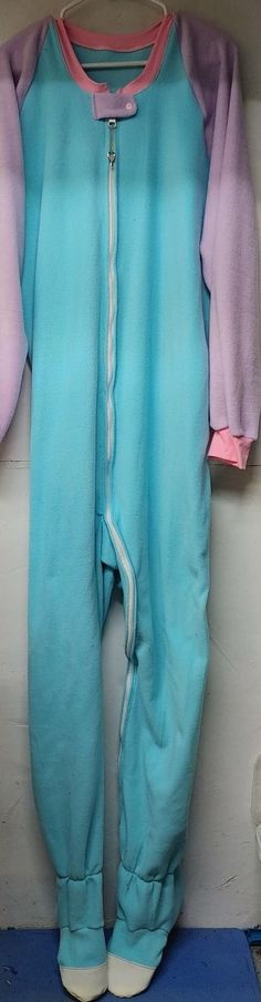 Are you looking for something soft and sweet to slip into? How about this cute lavendar and aqua vintage look footie pajama??? It features a locking zipper from neck to ankle. These footies also have elastic in the ankles, and vinyl toe caps for an even better fit! Once you place your order I will get the fabric ordered. When it arrives I will let you know, and can get started on it right away. :) I've attached a few pictures of exactly where/how to take the measurements, so please let me know i Care Bear Onesie, Adult Footie Pajamas, Adult Pajamas, Footie Pajama, How To Take, Vintage Look, Tie Dye Top, How To Fall Asleep, Vintage Looks