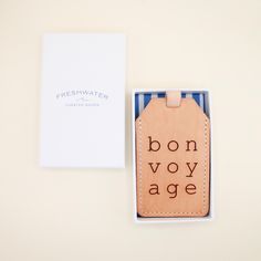 Earn those frequent-flier miles in style with our Bon Voyage Luggage Tag. It’s handcrafted with buttery-soft leather that holds up beautifully through spontaneous weekend getaways, family vacations, and work trips. Simply loop it onto your luggage and jet set the world - all you need to do is decide where to go next. DETAILS:Individual Size: 2.75" W x 4.5" HMade of Top-Grain Leather with a Suede StrapInterior luggage tag includes paper ID card with clear plastic coverComes packaged in a beautifu Luxury Luggage Tag With Sleeve For Travel, Leather Travel Accessories With Luggage Sleeve For Weekend Trips, Leather Rectangular Luggage Tag For Travel, Leather Travel Accessories For Weekend Trips, Brown Leather Travel Accessories As Gift, Brown Leather Luggage Tag For Travel, Leather Luggage Tags, Family Vacations, Leather Luggage