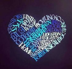 a heart made up of words on a black background