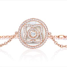 Celebrate Valentine's Day with a flower that will bloom all year. #debeerslondon #thehomeofdiamonds #valentinesday Mother Of Pearl Bracelet, Lotus Bracelet, Rose Gold Chain, Flower Motif, Rose Gold Bracelet, White Rose Gold, Lotus Flower, Diamond Solitaire, 18k Rose Gold