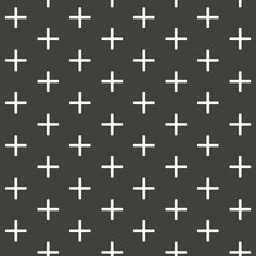 a black and white pattern with crosses on it's backgroung surface