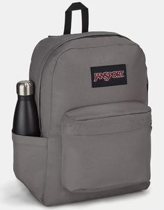 the jansport backpack is grey and has a bottle in it's back pocket