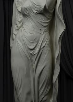 a statue of a woman in white with her hands on her hips and arms behind her back