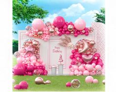 a pink and gold birthday party backdrop with balloons, streamers and decorations on the grass