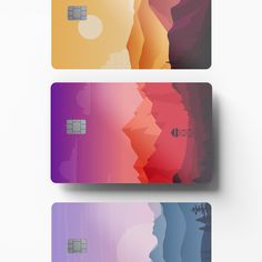 three credit cards with different colors and shapes on the front, back and side sides