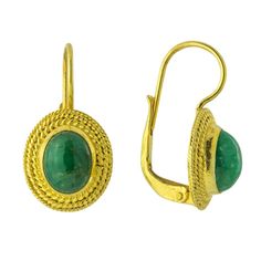 The value of an earrings is often determined by the compliments you get on them. Here a brilliant green emerald is set in simple oval filigree settings. Handmade of 24k gold over sterling silver. European backs for pierced ears. Size: 7/8 Inch. Emerald Cabochon Earrings As A Gift, Emerald Cabochon Earrings For Gift, Oval Emerald Earrings For Anniversary, Yellow Gold Oval Emerald Earrings, Oval Yellow Gold Emerald Earrings, Oval Emerald Earrings In Yellow Gold, Fine Jewelry Gold Oval Cabochon Earrings, Classic Gold Emerald Earrings, Emerald Oval Earrings For May Birthstone