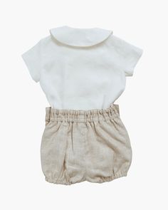 Introducing our elegant baby boy set, crafted from 100% luxurious linen. The short-sleeve shirt features a classic contrasting collar and a back button fastening, paired with sweet elasticated bloomers. This set is the perfect outfit for any celebration. Please allow 4 weeks between order and delivery for this bespoke garment to be made. White Linen Short Sleeve Sets, Classic Cream Summer Sets, Classic White Linen Set, Baby Boy Shirts, Girls Special Occasion Dresses, Elegant Baby, Christening Gowns, Boys Set, Baby Set