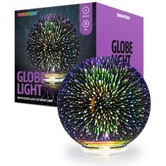 the globe light has been designed to look like fireworks and is in front of a box