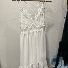 Brand Is Story On But Similar To Free People Dress And The Super Popular Tiktok Dress. Size Medium. Never Worn But Has Been In Storage. #Freepeople #Tiktok #Summer #Spring #Dress #Whitedress Lace Sundress With Lace Trim For Brunch, Flowy Lace Trim Sundress For Brunch, Lace Sundress For Brunch, Off White Flowy V-neck Mini Dress, White Sleeveless Fairycore Dress, Flowy V-neck Sundress With Lace Trim, Tiktok Dress, White Breezy V-neck Mini Dress, Urban Outfitters White V-neck Dress