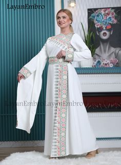 White Embroidered Anarkali Kaftan, Floral Embroidered Abaya For Eid Wedding, Multicolor Embroidered Kaftan For Eid Wedding, Multicolor Embroidered Kaftan For Wedding And Eid, Eid Wedding Multicolor Embroidered Kaftan, Fitted Embroidered Maxi Abaya, Embroidered Fitted Maxi Length Abaya, Modest Long Embroidered Kaftan, Embroidered Fitted Maxi-length Abaya