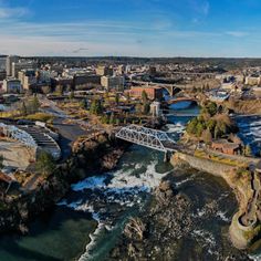 an aerial view of a bridge over a river