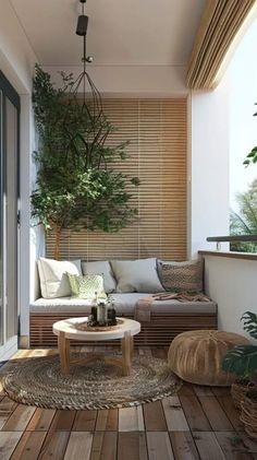 a living room filled with furniture and plants